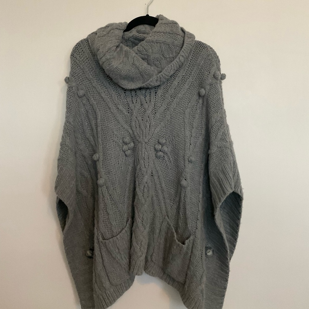 Cozy Gray Cable Knit Poncho. 35” x 35” with pockets and side buttons. One size